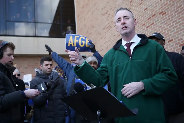 Rep. Brian Fitzpatrick (R-Pa.) speaks during a rally against the government shutdown outside Philadelphia International Airport in Philadelphia on Friday, Jan. 25, 2019.
