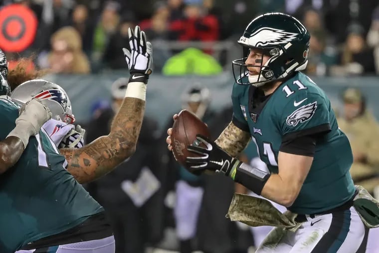 Patriots defensive tackle Danny Shelton reached out and batted the ball out of Eagles quarterback Carson Wentz’s hands, causing a fumble in the second quarter Sunday.