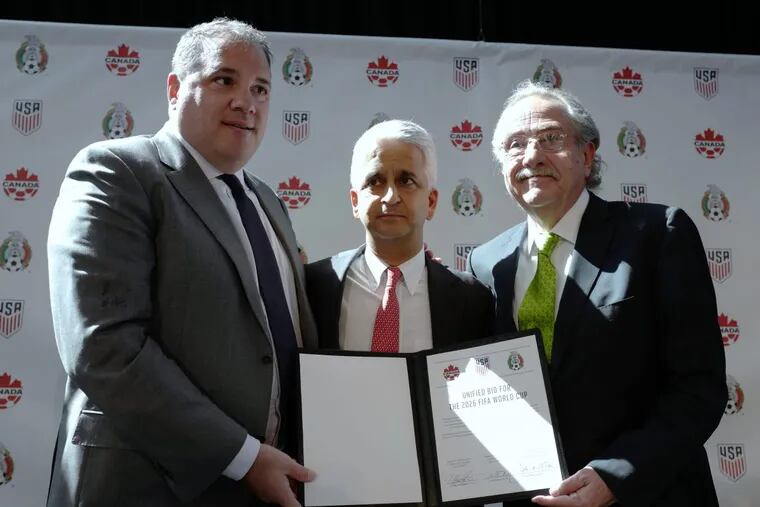 The United States, Canada and Mexico have put together a joint bid to host the 2026 FIFA World Cup soccer tournament. U.S. Soccer Federation president Sunil Gulati (center) chaired the bid committee until recently.