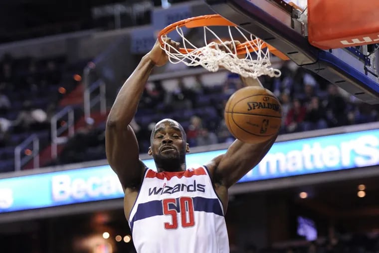Washington Wizards center Emeka Okafor (50) dunks during a March 2013 game.