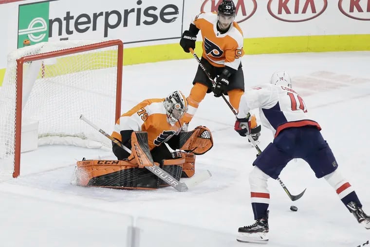 Carter Hart makes a save in the second period of a recent game against Washington. The rookie will likely play most of the Flyers' remaining games.