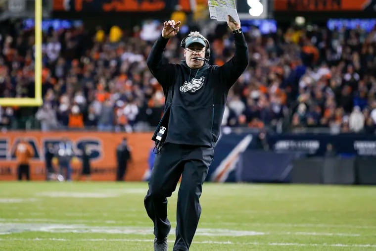 Eagles head coach Doug Pederson ran onto the field to call a timeout at one point during the game against the Bears at Soldier Field in Chicago.