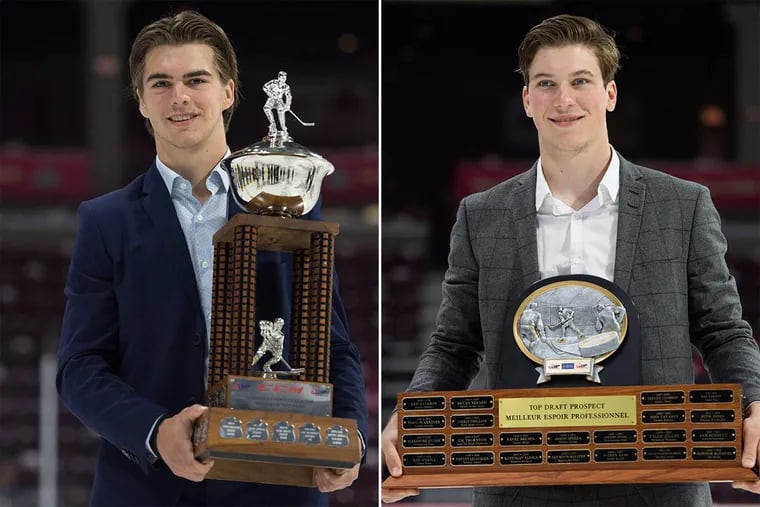 Nico Hischier (left) with his CHL Rookie of the Year award, and Nolan Patrick with his Top Draft Prospect award.