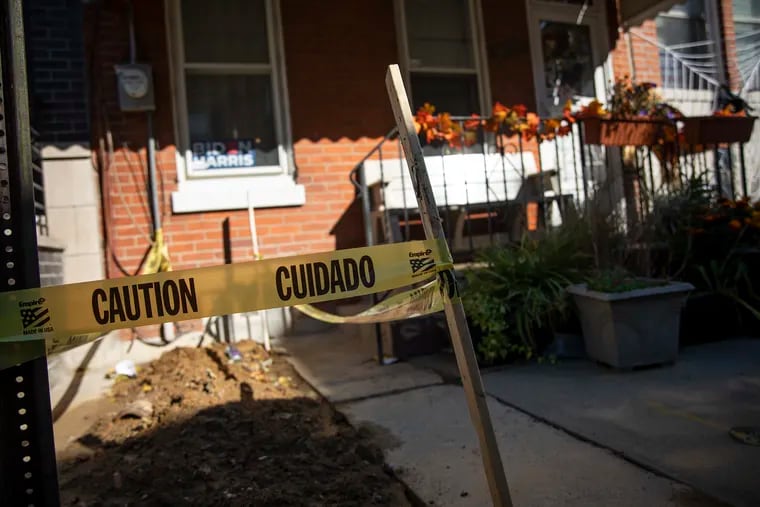 Caution tape marked repairs to a South Philadelphia home's plumbing in November 2020. The homeowner received grant funding to make several repairs. Pennsylvania's new Whole-Home Repairs Program, which will allow counties to apply for funds starting in December 2022, aims to help more residents.