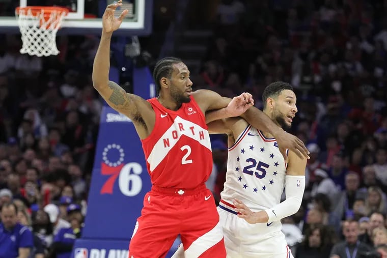 Ben Simmons (right) defends against Kawhi Leonard during Game 4.