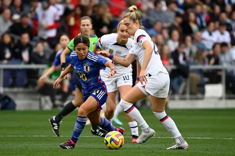 Kristie Mewis (right) played a big game in the U.S. women's soccer team's win over Japan on Sunday.