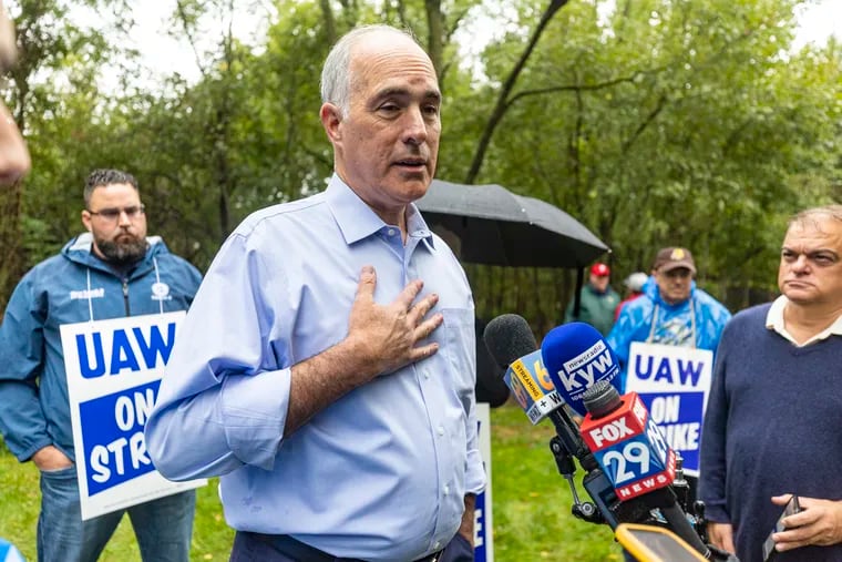 Senator Bob Casey Jr., visits UAW picket line outside the General Motors Customer Care and Aftersales, and speaks with press in Langhorne, Pa., on Tuesday, Sept. 26, 2023.