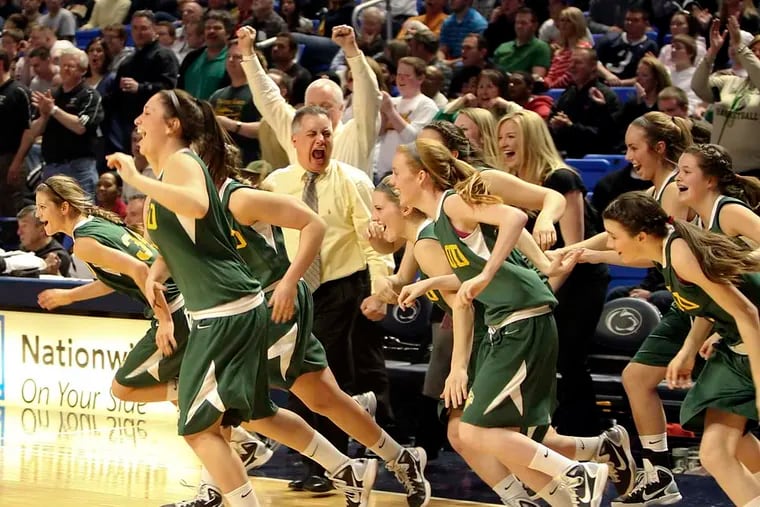 Archbishop Wood coach Jim Ricci (center) screams after his team wins the Class AAA state girls' basketball championship in 2011.  ( Steven M. Falk / Staff Photographer )