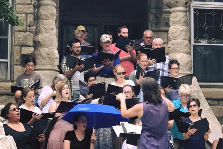 The St. Francis de Sales choir sings during West Philadelphia's Porchfest in 2019.