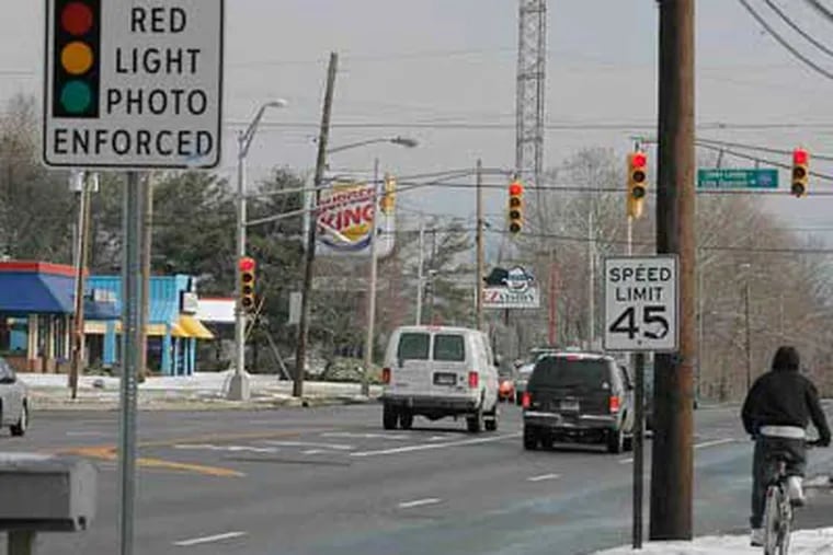The intersection of Blackwood-Clementon and Little Gloucester Roads is one of four intersections in Gloucester Township equipped with cameras to catch red-light violators. (Akira Suwa / Staff)