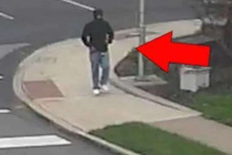 Lansdale police are looking to identify this man, seen crossing North Broad Street and 7th Street in the borough at 6:33 p.m. April 29. Torres, 33, was last seen alive April 29. Torres' body was found in his own car at the Twin Pines apartment complex on the 700 block of North Valley Forge Road in Lansdale.