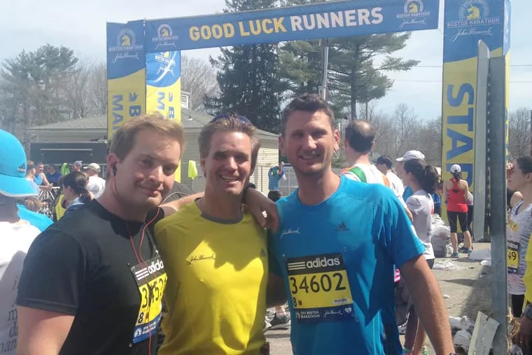 Will Mullin (center), of Malvern, is flanked by two friends from California, Joe Stapleton (left) and Dan Bistany, whom he had met last year at the Boston Marathon.