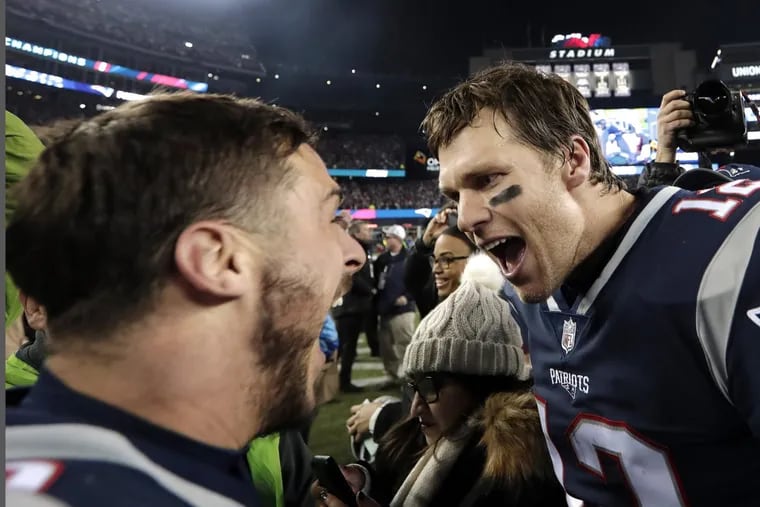New England Patriots wide receiver Danny Amendola, left, and quarterback Tom Brady celebrate their victory over the Jacksonville Jaguars in the AFC championship game.