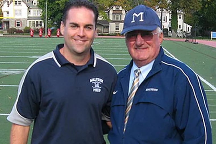 Retired Malvern Prep football coach Gamp Pellegrini (right) and son Kevin, now the head coach at the school. (File photo)