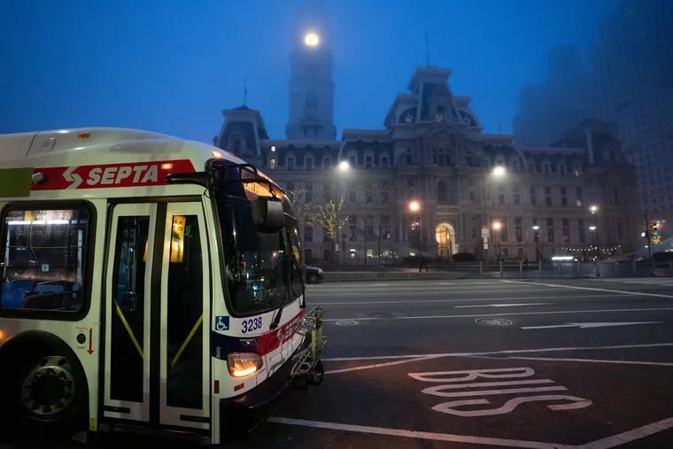 A SEPTA bus in front of City Hall on an early morning route. The authority launched the "SEPTA Disaster Relief Memorial Fund" on Monday.