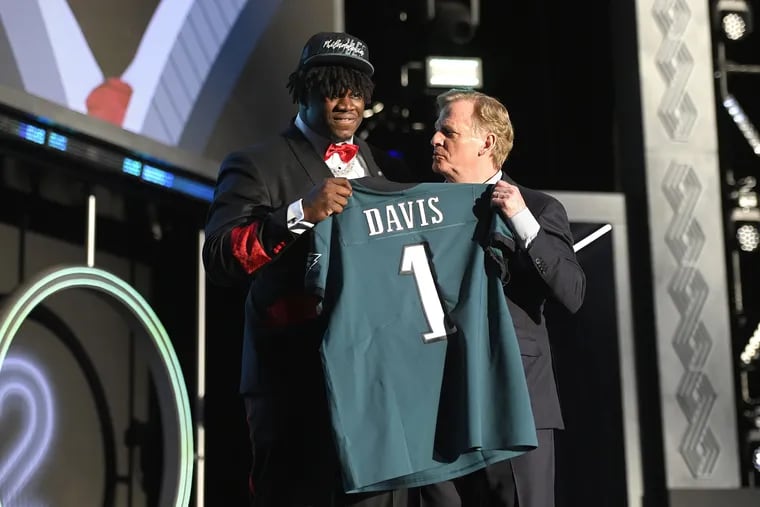 Jordan Davis, left, with NFL Commissioner Roger Goodell onstage after being selected 13th overall by the Philadelphia Eagles during the first round of the  NFL Draft on Thursday, April 28, 2022, in Las Vegas. (David Becker/Getty Images/TNS)