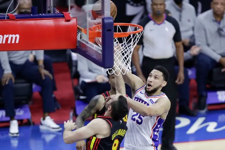 Sixers guard Ben Simmons attempts to lay-up against Atlanta Hawks forward Danilo Gallinari during the first quarter in Game 7 of the NBA Eastern Conference playoff semifinals on Sunday, June 20, 2021 in Philadelphia.