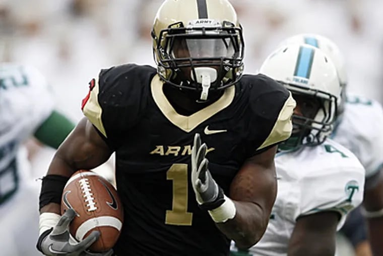 Army running back Raymond Maples (1) runs past the Tulane defense for touchdown during the second half of an NCAA college football game in West Point, N.Y., on Saturday, Oct. 1, 2011.  Army won, 45-6. (AP Photo / Mike Groll)