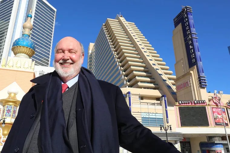 Stockton University president Herman Saatkamp stands in front of the Showboat Casino, once the proposed home of the Island Campus, in Atlantic City, N.J. ( Edward Lea / The Press of Atlantic City via AP )