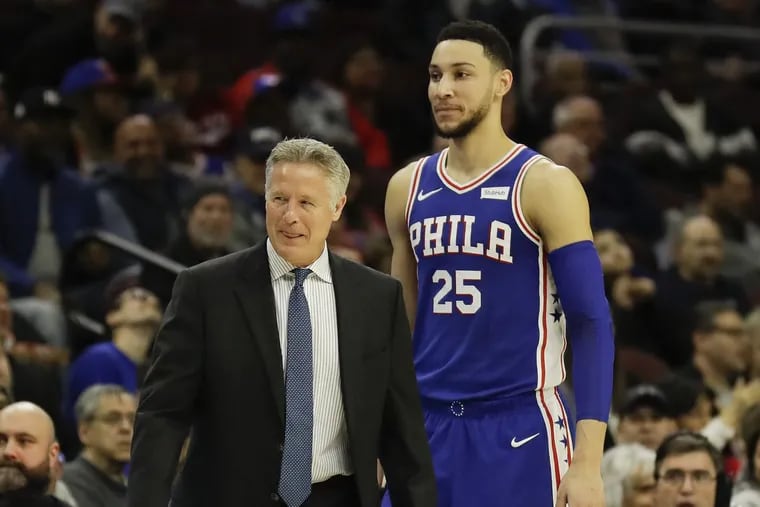 Sixers coach Brett Brown with Ben Simmons during a game last month against the Knicks.