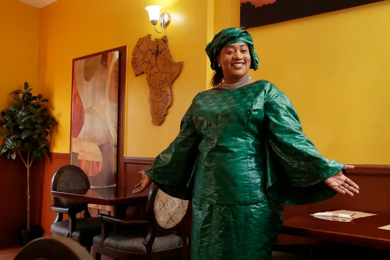 Chef-owner Youma Ba in the dining room of her West African restaurant Youma in 2022.
