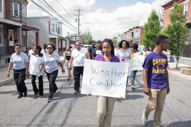 Community organizers travel with students, parents & administrators from Camden High School on their 2.4 mile walk home on Monday, June 6th, 2016.