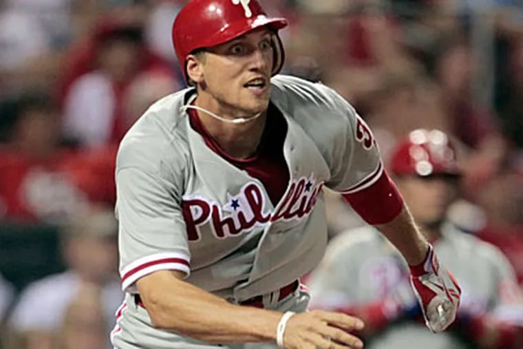 Hunter Pence hit a two-run go-ahead home run in the top of the 10th to set the Phillies up for a win. (Jeff Roberson/AP)