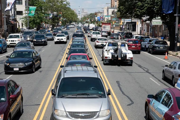 Cars line the median on Broad Street between Shunk and Porter Streets.
