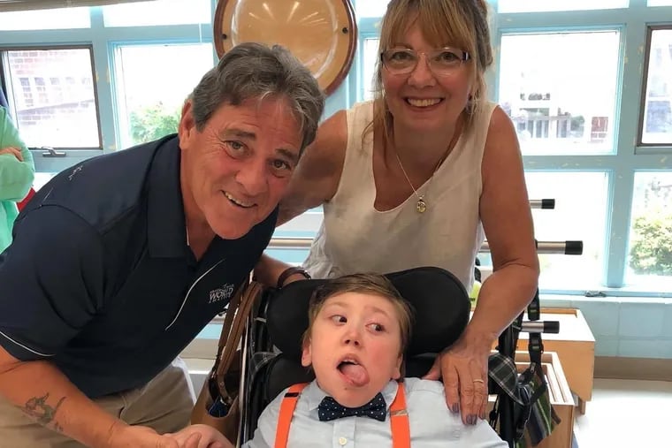 Robin and Jim Graves with their son, Joey, who has complicated medical needs and whom they adopted just as they were retiring.