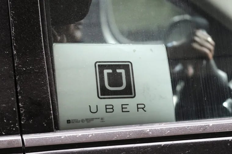 An Uber car drives through LaGuardia Airport in New York.