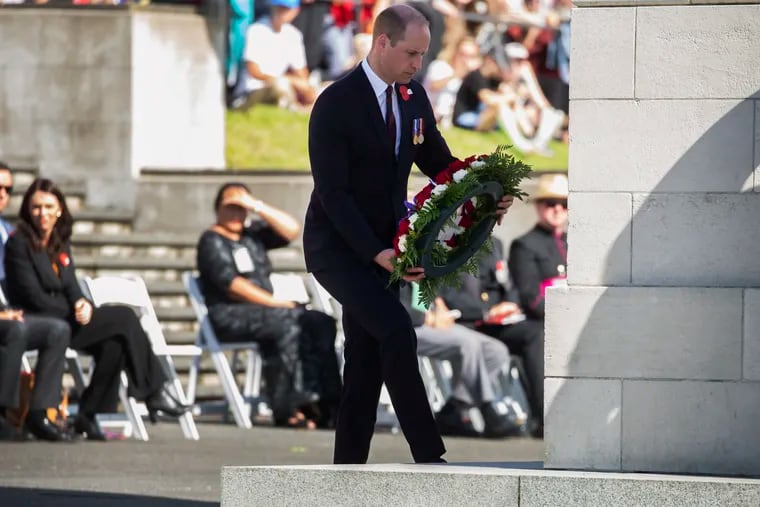 Britain's Prince William lays a wreath during an Anzac Day service in Auckland, New Zealand, Thursday, April 25, 2019. (Brett Phibbs / SNPA via AP)