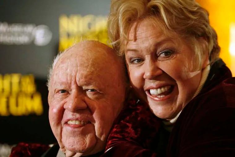 Actor Mickey Rooney (L) and his wife Janice arrive at the American Museum of Natural History for the premiere of the movie "Night at the Museum" in New York in this file photo taken December 17, 2006. The estranged wife of actor Mickey Rooney and his estate are locked in a legal tussle over the remains of the late Hollywood movie star, who left an estate of only $18,000, according to court documents. (REUTERS/Eric Thayer/Files)
