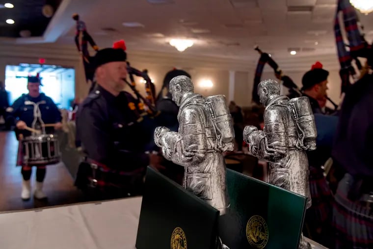 Passing award statues, the Philadelphia Police and Fire Pipe and Drum Band closes out ceremonies Sunday at the annual "Recognition Day" held by Philadelphia Firefighters & Paramedics Local 22. Dozens of firefighters, paramedics and private citizens were honored for acts of heroism.