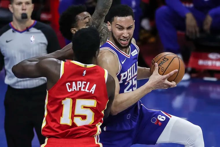 Ben Simmons drives to the basket against Atlanta's Clint Capela during the first quarter Friday night. Simmons finished with 18 points for the Sixers in their 126-104 win.