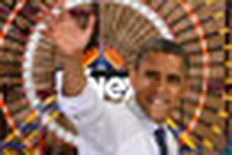 President Obama waves goodbye as he walks past a ferris wheel after speaking to workers and guests at the K'Nex factory in Hatfield, Pa. on 11/30/12. ( Michael S. Wirtz / Staff Photographer )