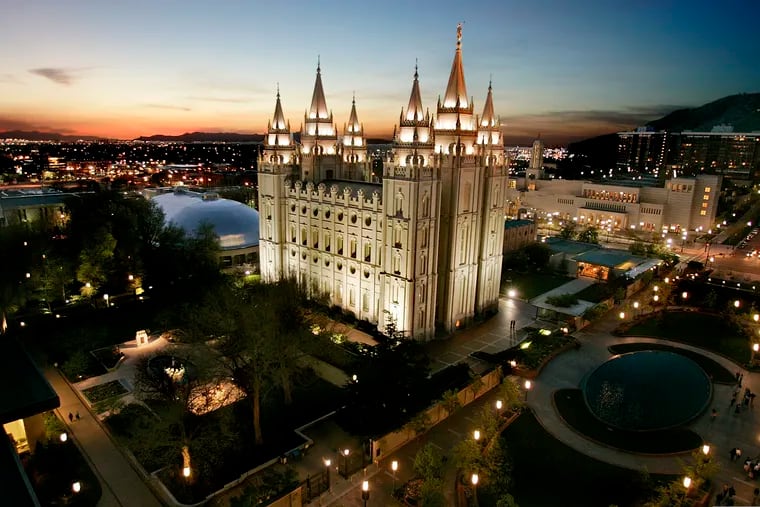 In this April 27, 2006, file photo, the sun sets behind the Mormon Temple, the centerpiece of Temple Square, in Salt Lake City.