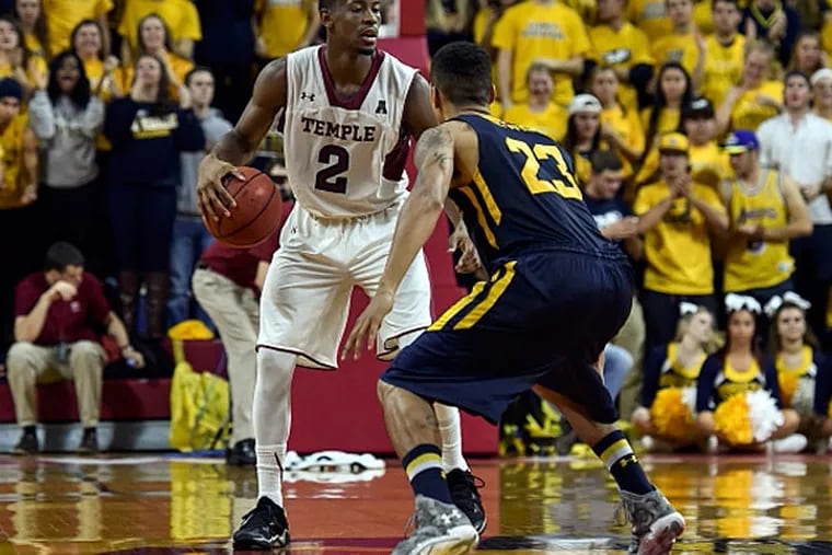 Temple Owls guard Will Cummings (2) looks to pass as La Salle Explorers guard Khalid Lewis (23) defends during the second half of the game at the Palestra. (John Geliebter/USA TODAY Sports)