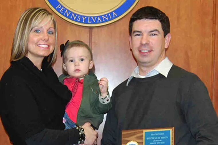 Officer Gorman with his wife, Jennifer, and children, Ava and Brendan, after the award ceremony.