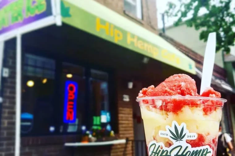 A cup of Cheerful Cherry and Mellow Mango CBD-infused water ice at the Hip Hemp Cafe near 7th and South Streets in Philadelphia.