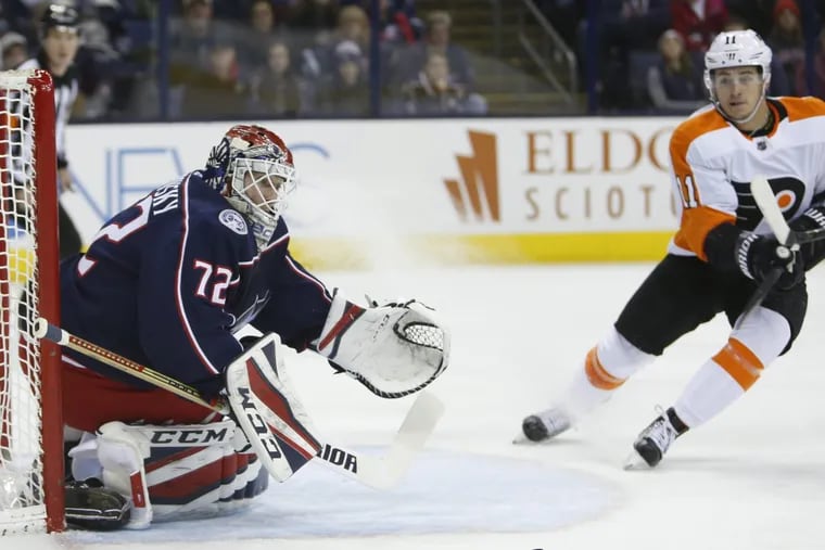Columbus Blue Jackets' Sergei Bobrovsky, of Russia, makes a save against Philadelphia Flyers' Travis Konecny during the first period of an NHL hockey game Saturday, Dec. 23, 2017, in Columbus, Ohio.