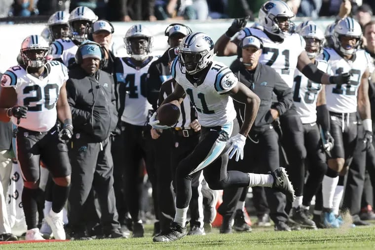 Torrey Smith runs for a crucial first down on the Panthers' fourth-and-10 try in the fourth quarter.