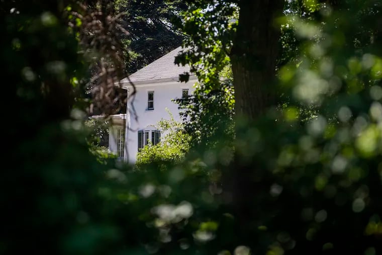 A home seen through the woods is Senate candidate Mehmet Oz's property in Lower Moreland.