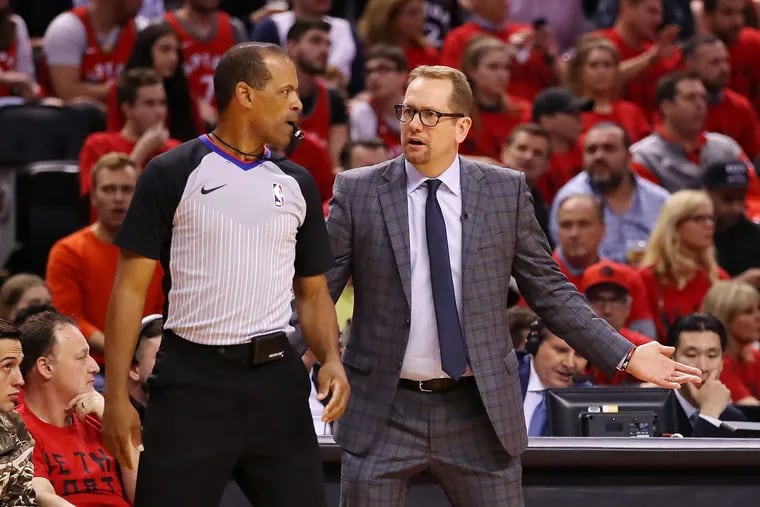 Nick Nurse trying to get in the ear of an NBA official during the Raptors' Eastern Conference Finals series against the Bucks.