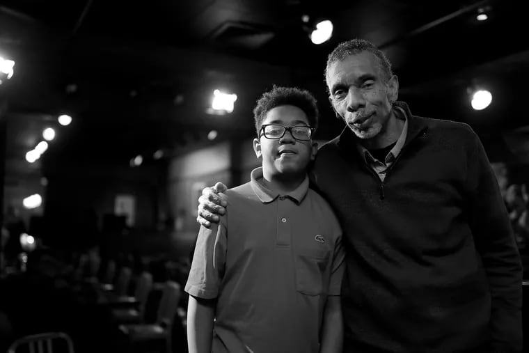 Jazz bassist Mike Boone and his 12-year-old son, Mekhi, a drummer, pose before playing a gig together at Chris' Jazz Cafe in Philadelphia on February 12, 2019.