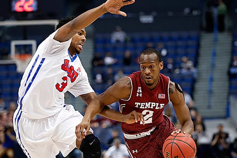 Temple guard Will Cummings drives the ball against Southern Methodist  guard Sterling Brown. (David Butler II/USA Today Sports)