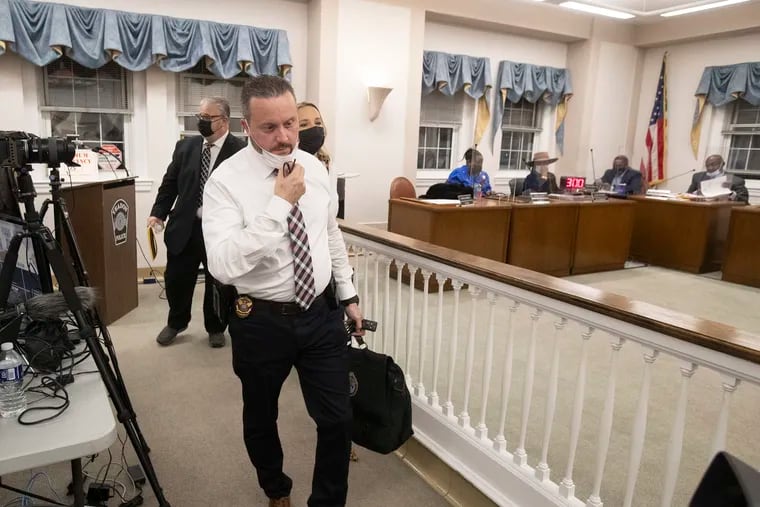 Anthony Paparo leaves a Yeadon Borough Council meeting in February 2022 after a 4-3 vote to fire him as police chief. A federal judge last week ruled that Paparo's claim of racial discrimination will go before a jury.