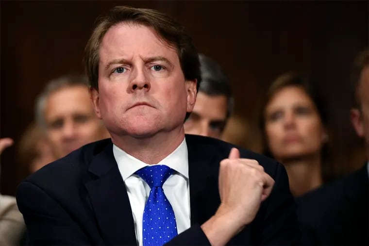 In this Sept. 27, 2018, file photo, White House counsel Don McGahn listens as Supreme court nominee Brett Kavanaugh testifies before the Senate Judiciary Committee on Capitol Hill in Washington.