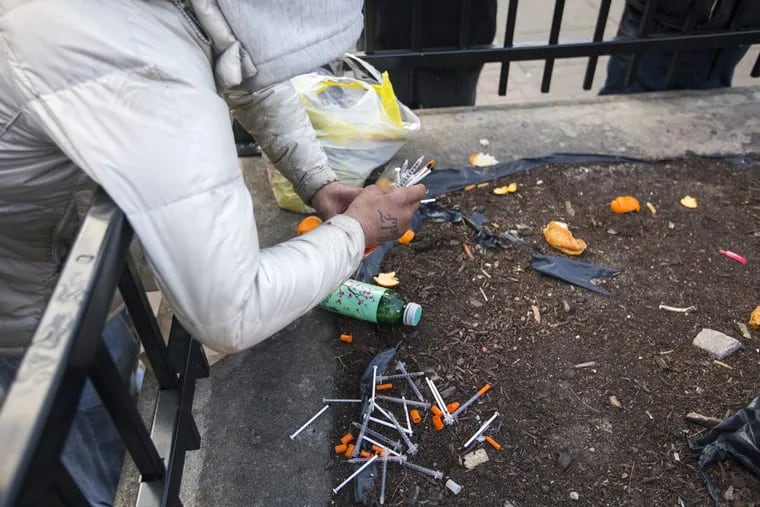 Peter LaRosa showing the needles he collects on the ground in Camden in order to exchange them for new ones in Philadelphia.