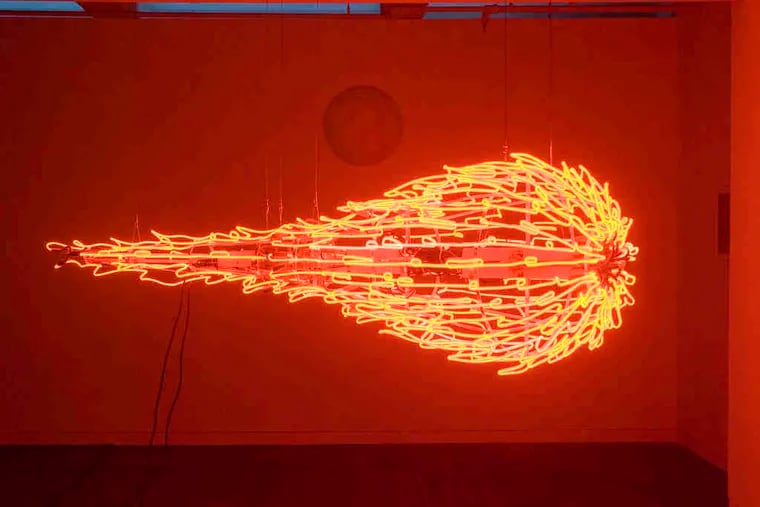 Tristin Lowe's neon sculpture &quot;Comet: God Particle&quot; (2011) isn't kinetic, but leaves the impression of motion.