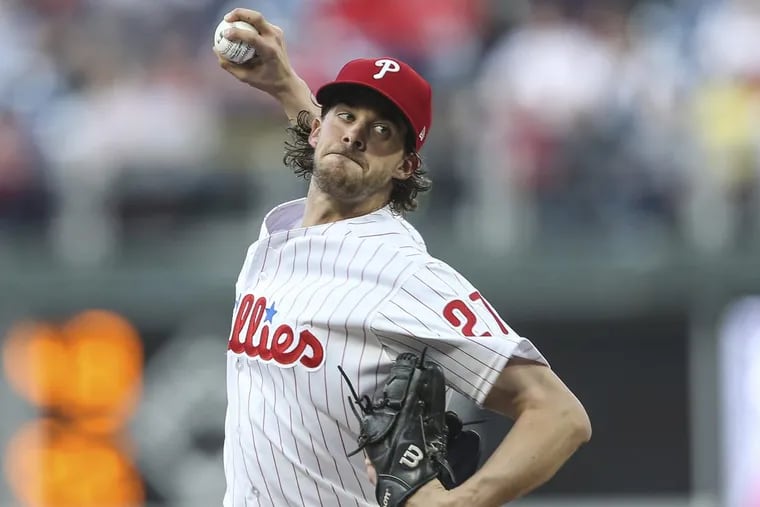 Phillies’ pitcher Aaron Nola throws against the Giants during the first inning at Citizens Bank Park in Philadelphia on Tuesday.